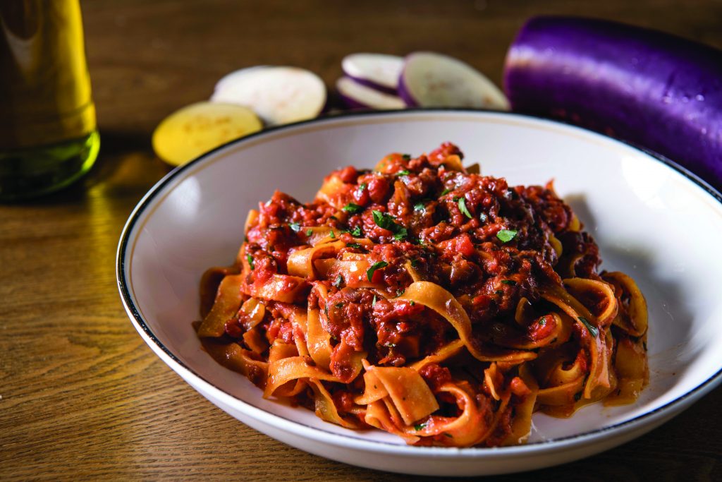 Vegan eggplant bolognese pasta dish at Posto Pubblico in Hong Kong