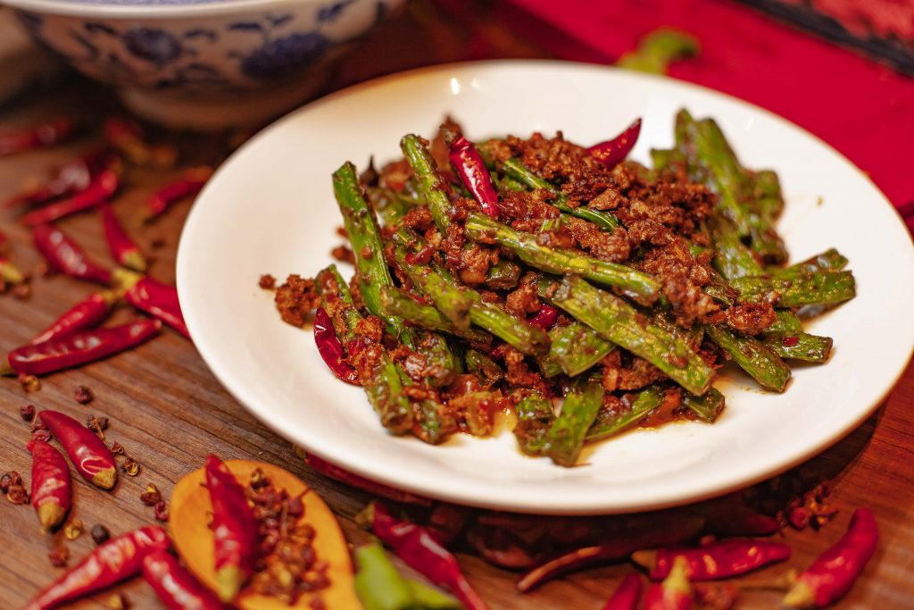 Sichaunese green beans with vegan Omnipork at Chilli Figara in Hong Kong