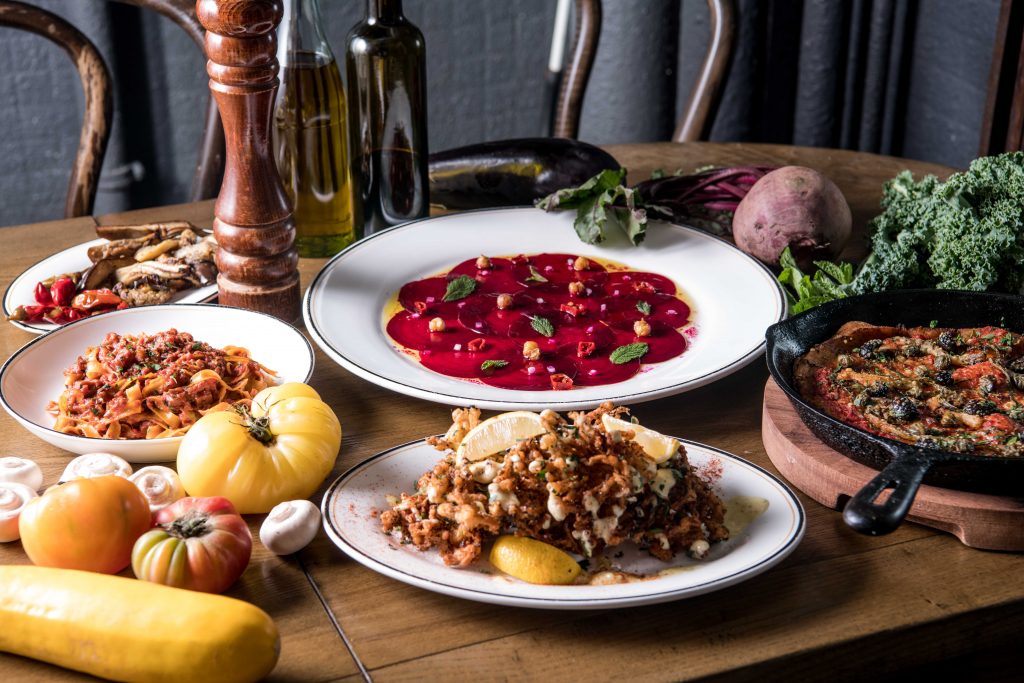 Beetroot carpaccio and other vegan dishes at Posto Pubblico in Hong Kong.