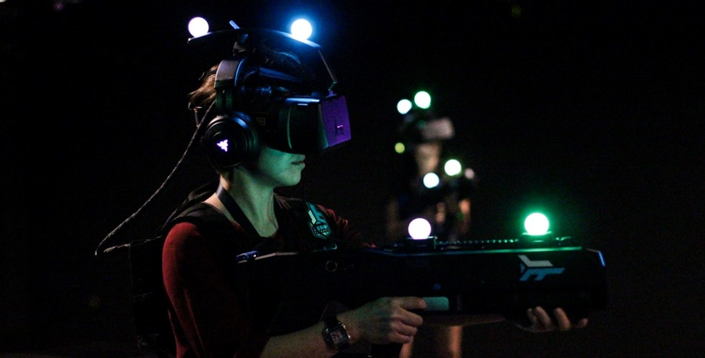 A person wears a virtual reality headset at Zero Latency in Hong Kong, a Christmas experience gift option.