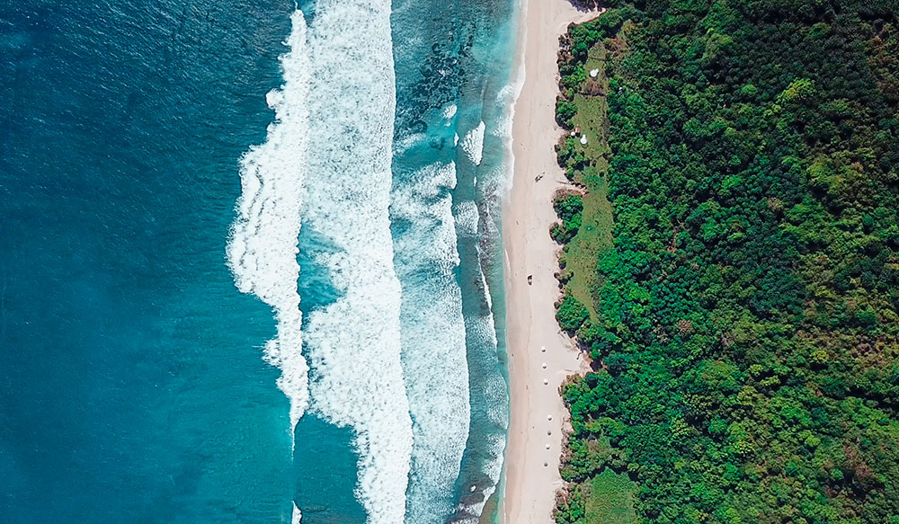 An aerial shot of Bali shoreline. 