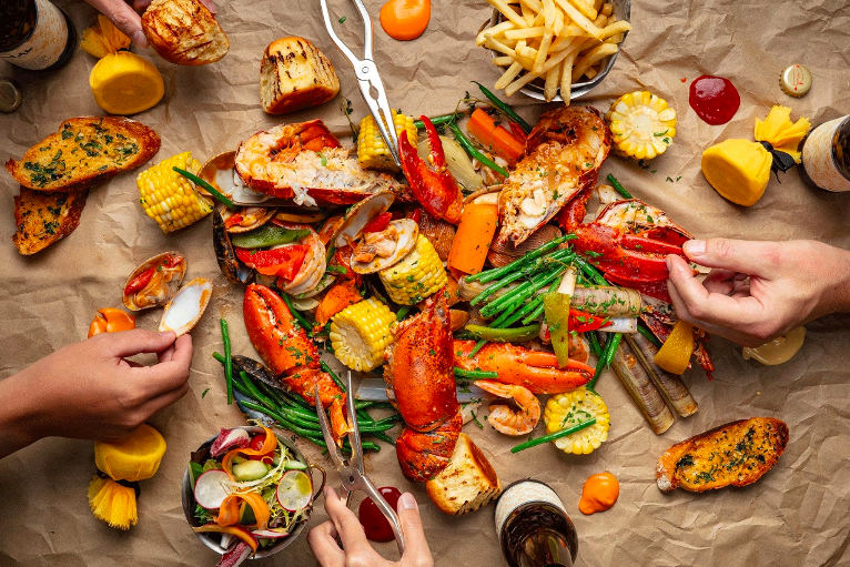 A parchment paper filled with lobster and shellfish, part of the lobster boil special menu at the Island Shangri-La in Hong Kong. 