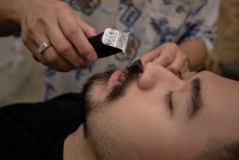A man's moustache is shaved off for Movember, to raise awareness of men's health